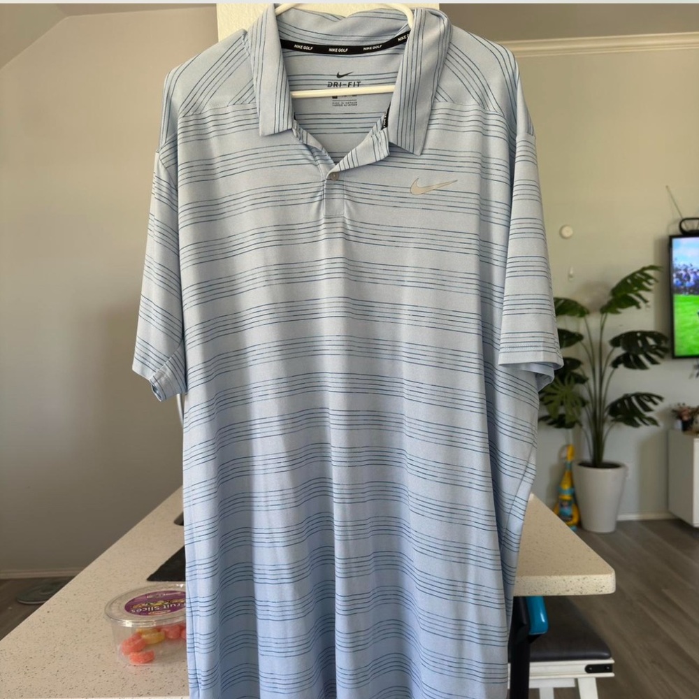 Nike Men's Blue Striped Polo Shirt